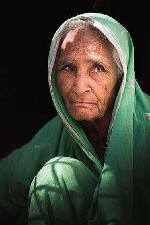 Portrait of old Rajasthani Indian woman with sari, India