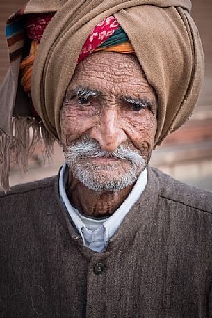 Portrait of very old rajasthani Indian man with turban, Pali India