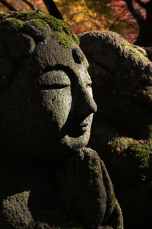 Some of the 1200 Rakan statues in Otagi Nenbutsu-ji temple in Arashiyama, Kyoto, Japan