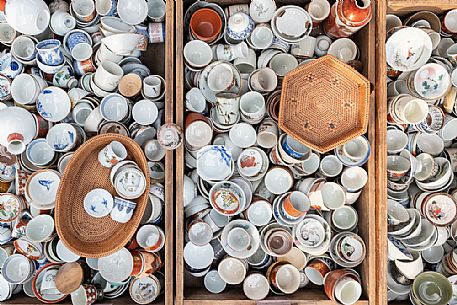 Japanese cups and pots at Tenjin Ichi flea Market, Kyoto, Kitano Tenmangu Shrine. This is one of Kyoto biggest antiques market, Japan