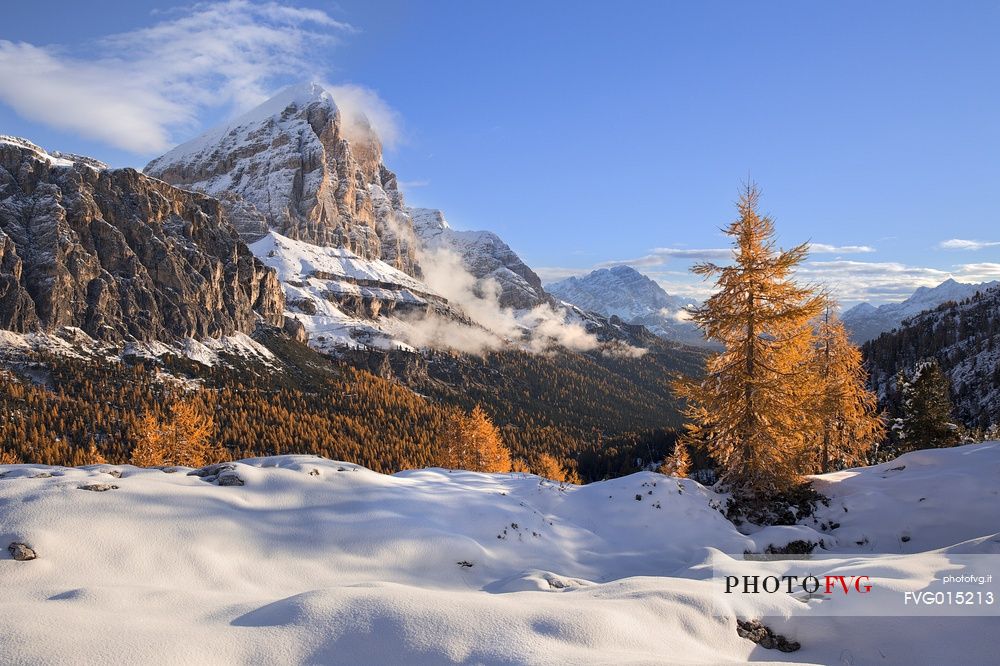 View to the Tofana di Rozes in an autumn  morning with the snow 