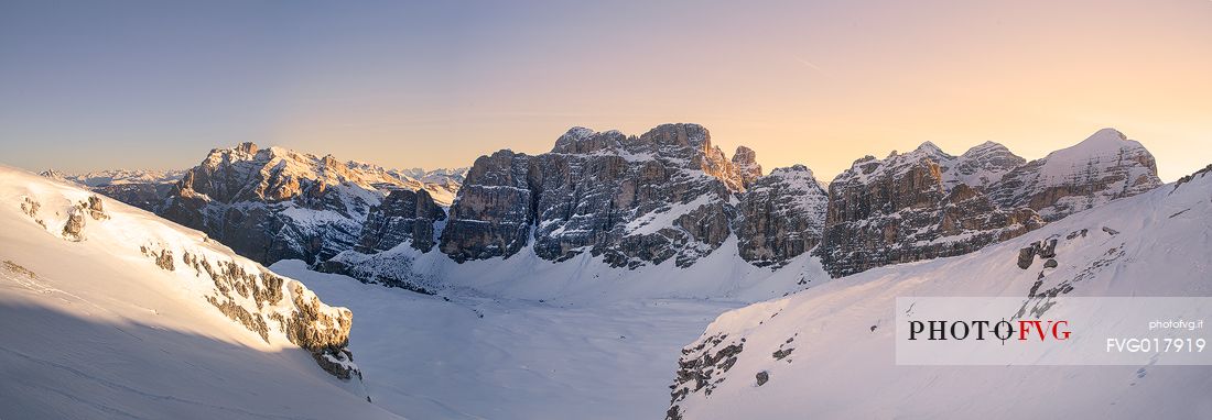 The group of Fanis and Tofane during a winter sunrise