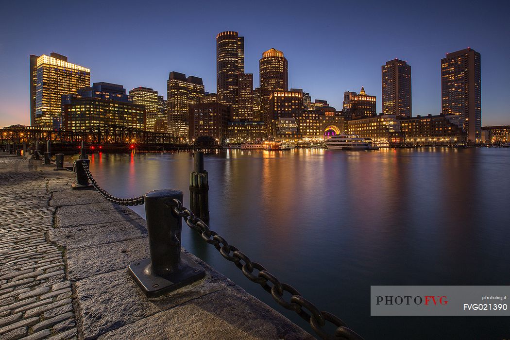 Boston skyline from the Boston harbor during the blue hour, New England, USA