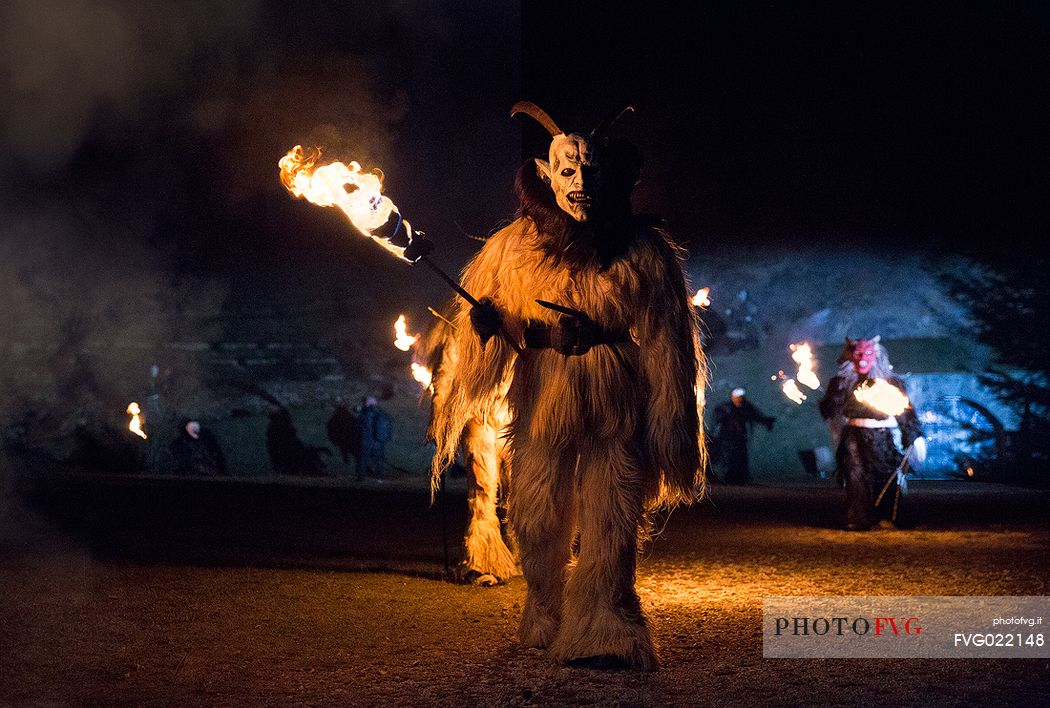 Krampus during the traditional festival. The Krampus are men-wild goats and very disturbing that roam the streets in search of children 