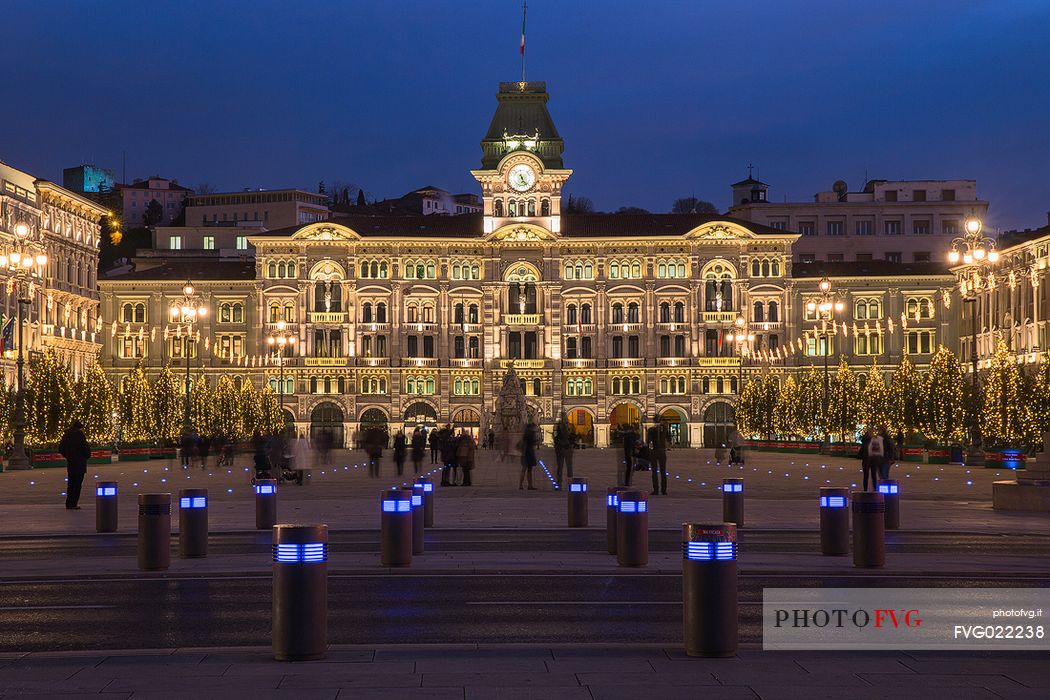 Unity of Italy Square or Piazza Unit d'Italia with the Town Hall on background at Christmas time, Trieste, Italy