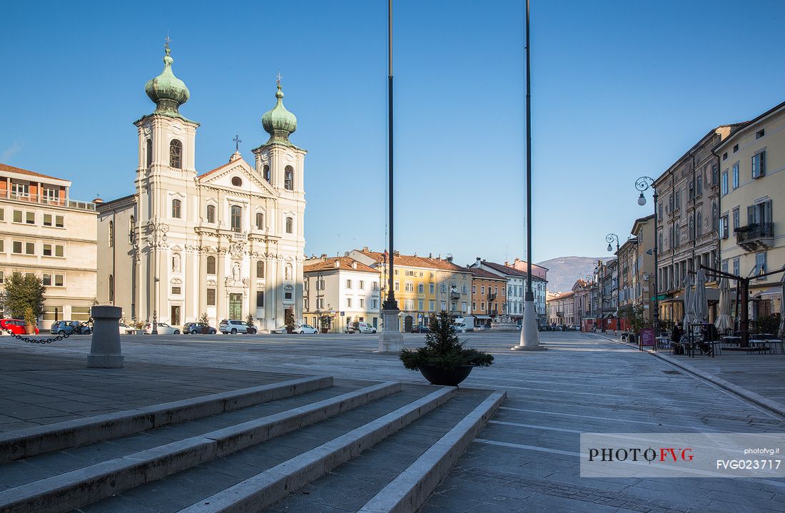 Gorizia's square with the Saint Ignazio church illuminated by early morning light, Friuli, Italy