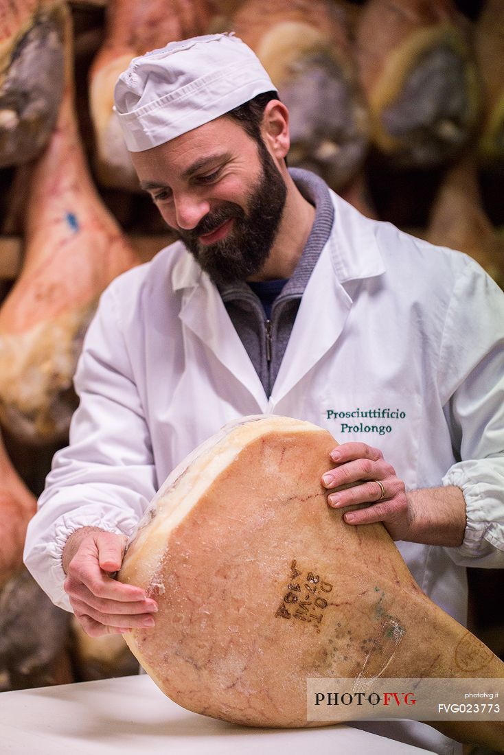 Grouting of the San Daniele del Friuli ham  at the Prolongo ham industry, Italy