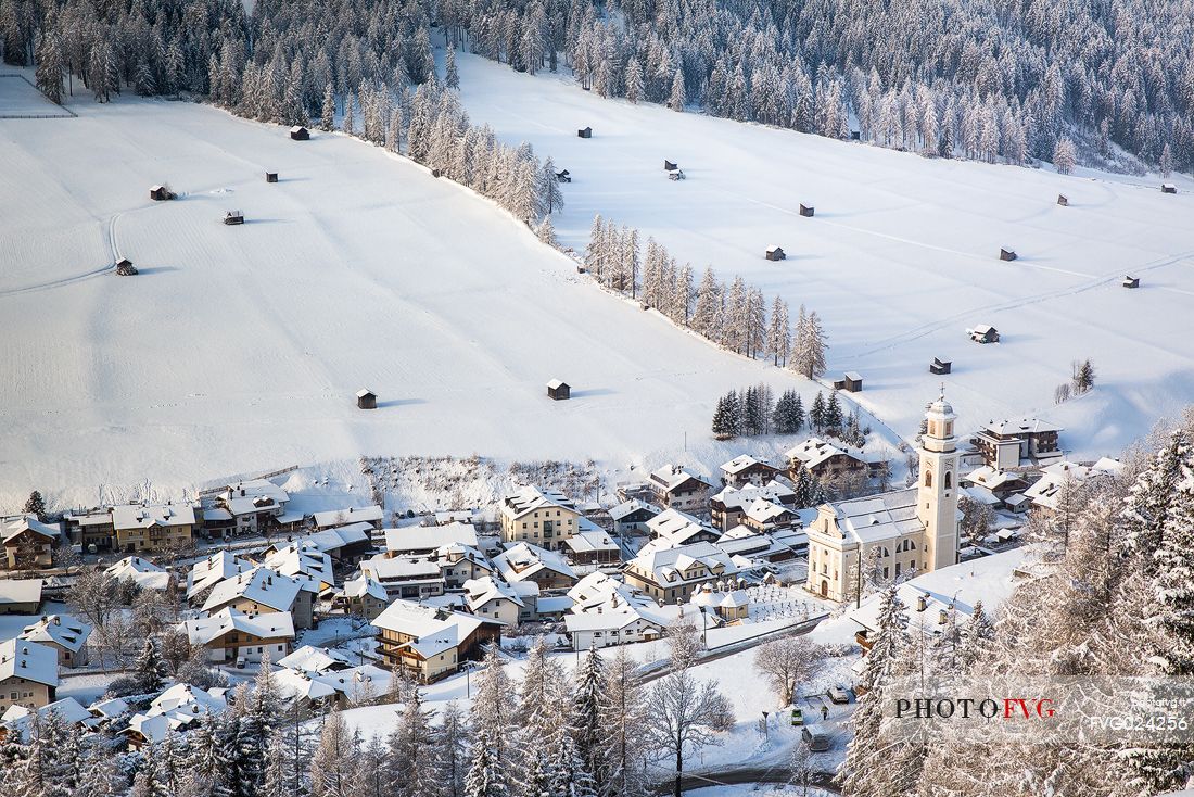 Sesto village from above after a snowfall, Pusteria valley, Italy