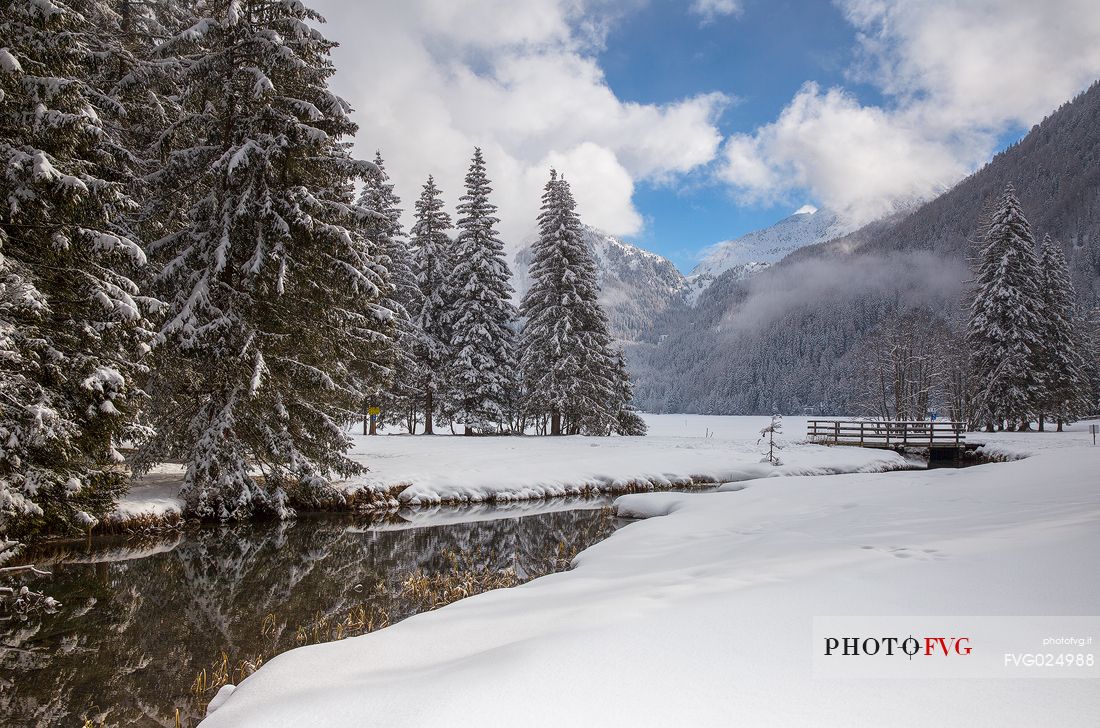 The snow-covered landscape of Lake Anterselva, Pusteria Valley, Italy