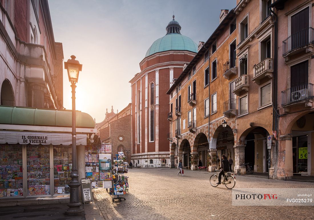 Contr Garibaldi, one of the roads that connect the city center and in the background the apse and dome of the Cathedral of Vicenza, Italy