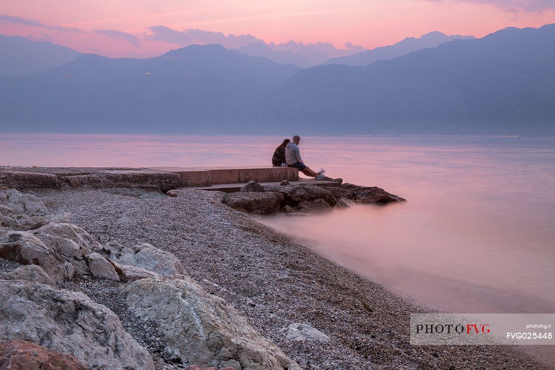 A romantic sunset over Garda lake at Malcesine, Italy