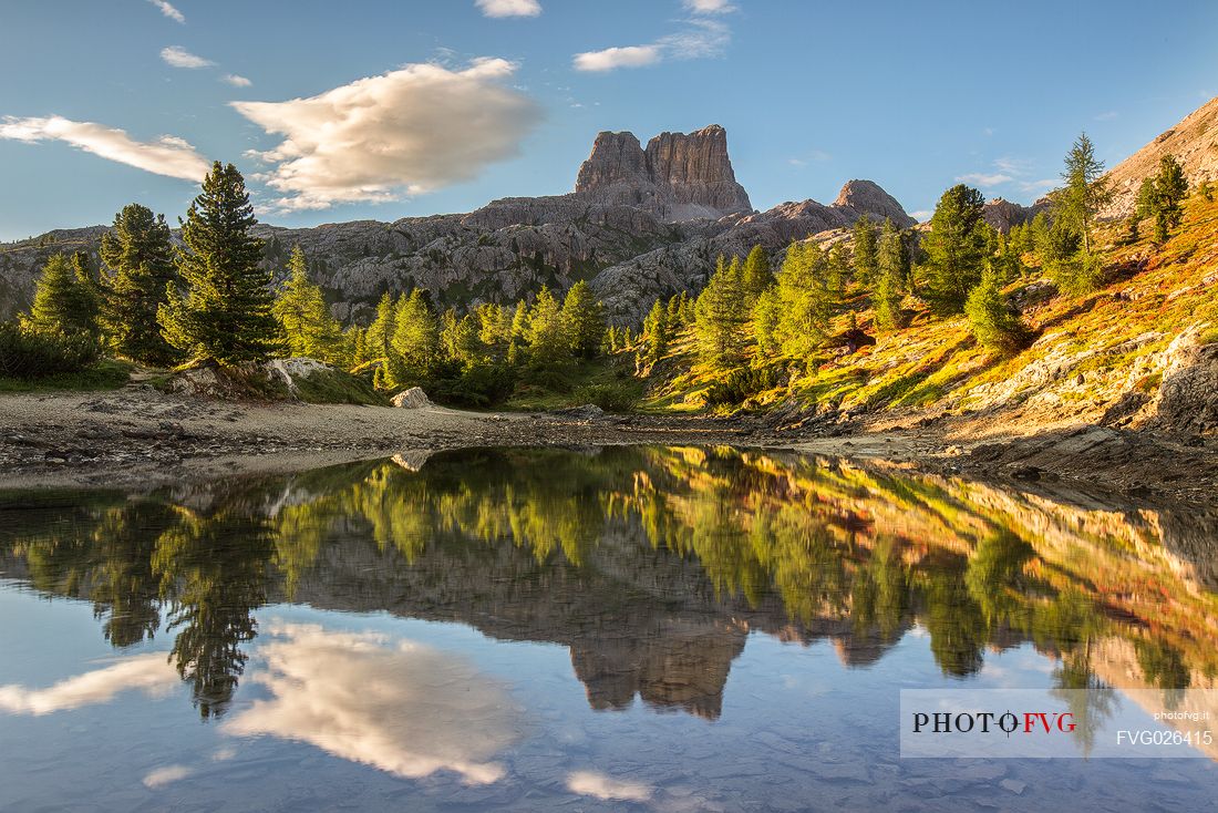 The Averau Mount reflected on the little pond of Limedes at sunset, Dolomites, Cortina D'Ampezzo, Italy