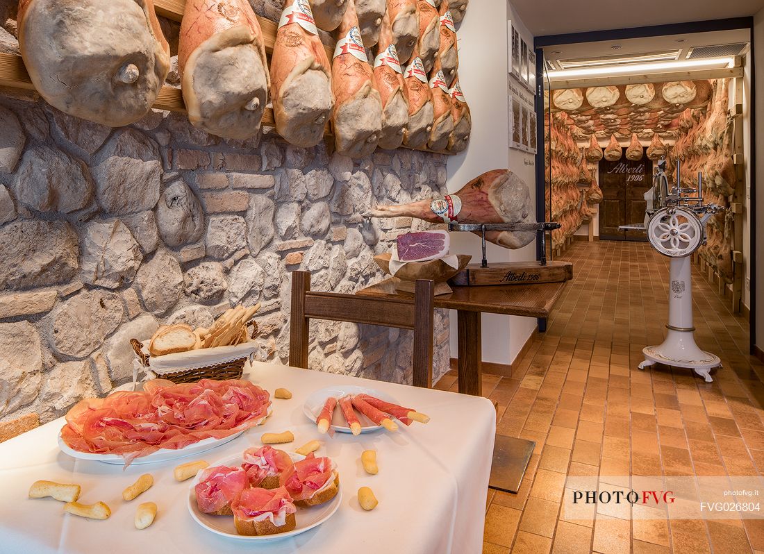 Tasting of raw ham of  La Casa del Prosciutto,the historic ham company of the  Alberti family in San Daniele del Friuli, Friuli Venezia Giulia, Italy