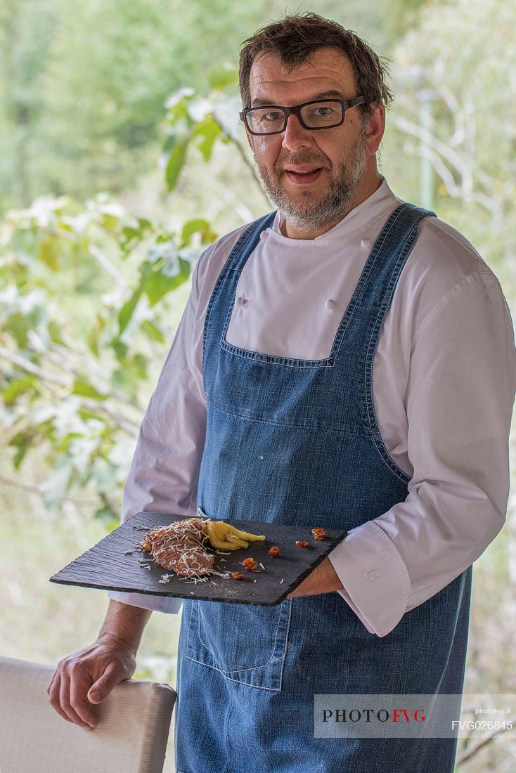 Alessandro Gavagna, starred chef of  La Subida, Trattoria al Cacciatore shows one of his typical dishes, Cormons, Friuli Venezia Giulia, Italy