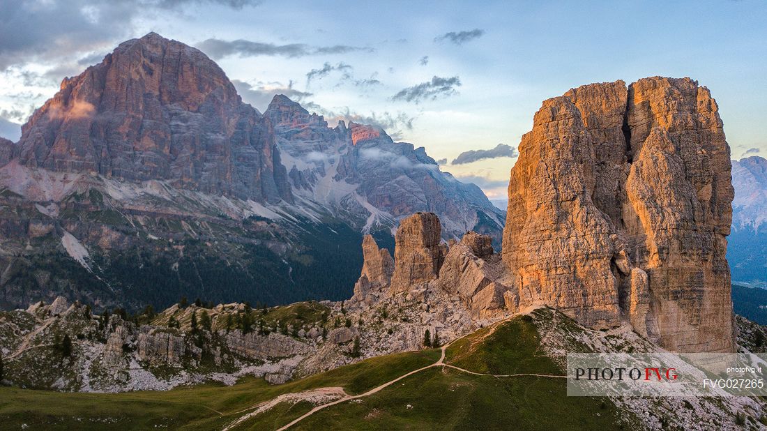 The  mountainous complex of Cinque Torri with the Tofana di Rozes on background at sunset, Dolomites, Cortina D'Ampezzo, Italy