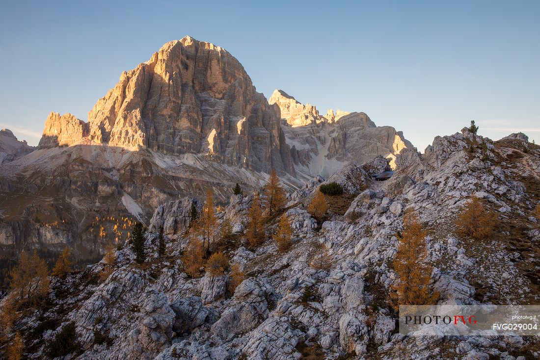 The Tofana di Rozes illuminated by the last light of an autumn afternoon, Dolomites, Cortina d'Ampezzo, Italy