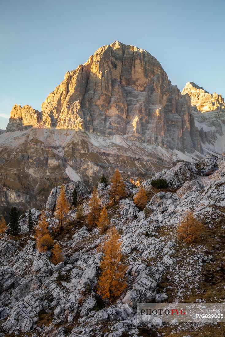 The Tofana di Rozes illuminated by the last light of an autumn afternoon, Dolomites, Cortina d'Ampezzo, Italy