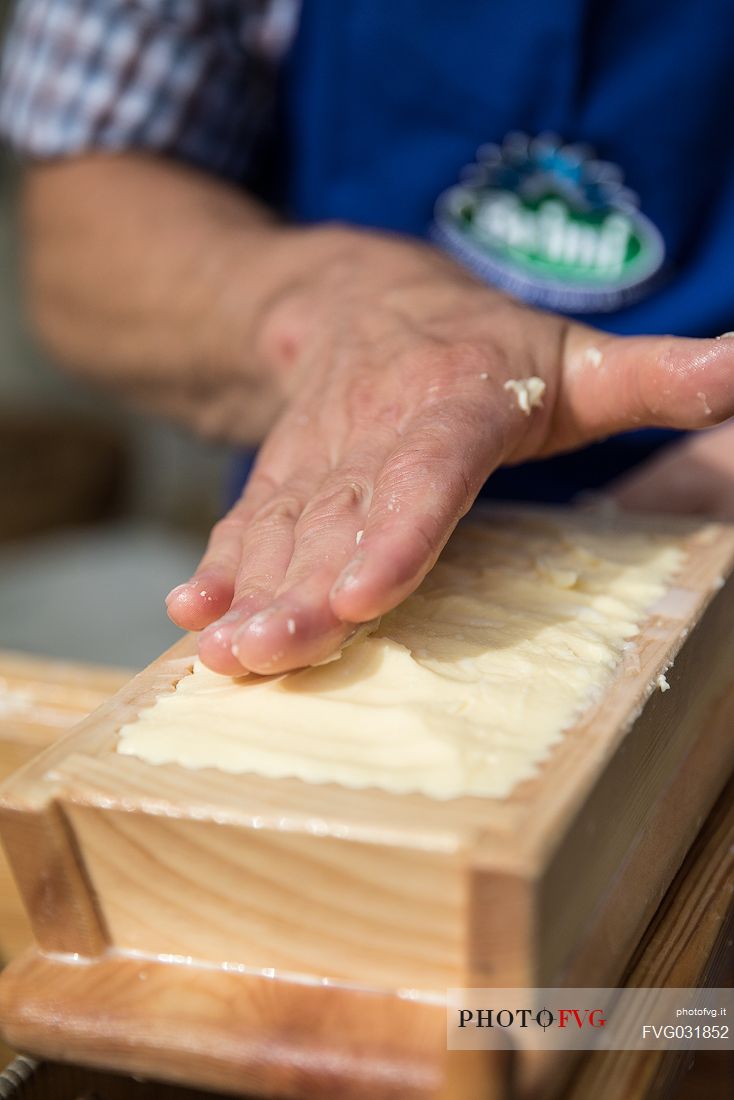 Preparation of the butter during the traditional festival of bread and strudel in Bressanone, Isarco Valley, Trentino oAlto Adige, Italy, Europe