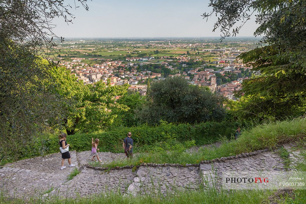 Tourists walk the promenade that leads from the Upper castle or Castello Superiore to the town of Marostica, Vicenza, Veneto, Italy, Europe