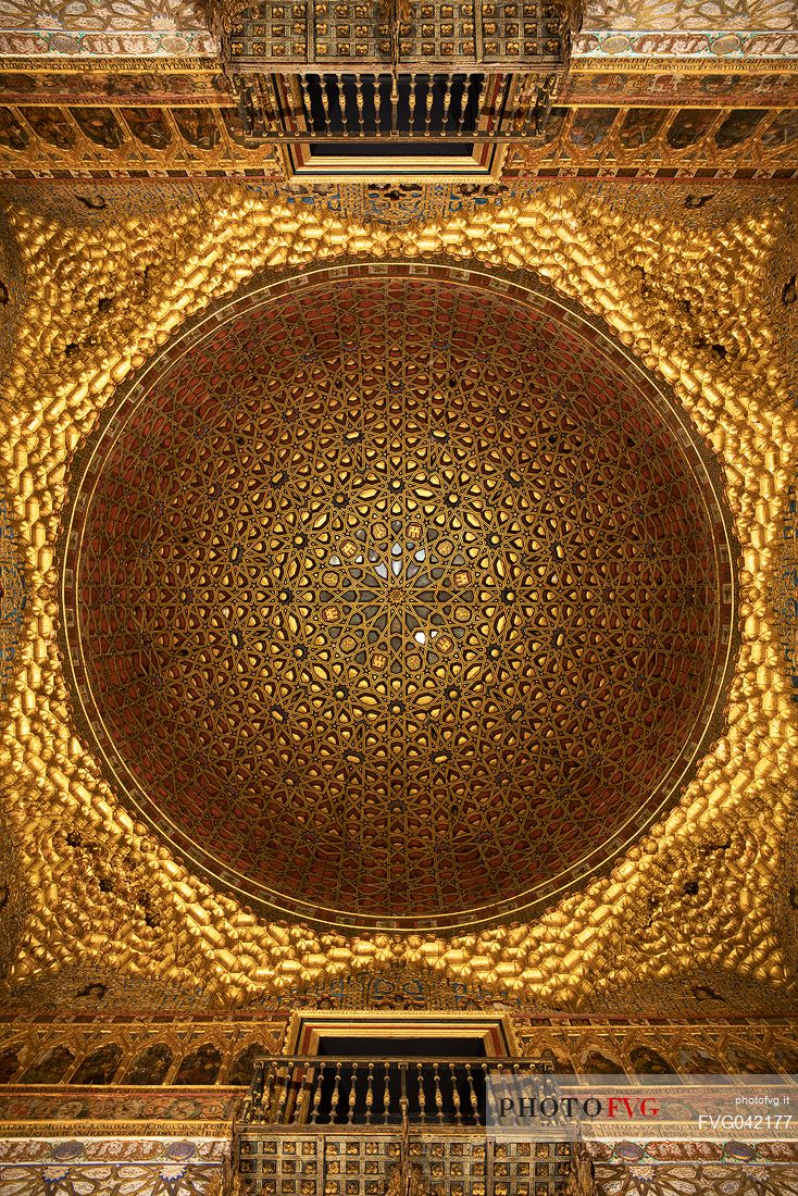 The dome of the Hall of Ambassadors, made of carved and gilded woven wood, in the Palace of the Real Alcazar, Seville, Andalusia, Spain, Europe