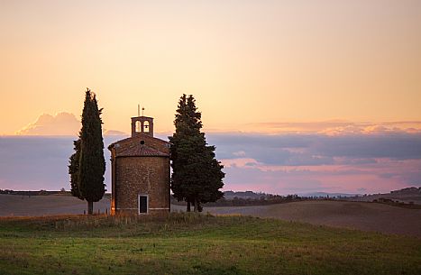 The chapel of Madonna della Vitaleta during a soft sunset