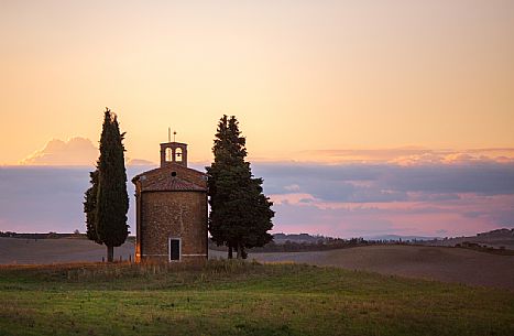 The chapel of Madonna della Vitaleta during a soft sunset The chapel of Madonna della Vitaleta during a soft sunset