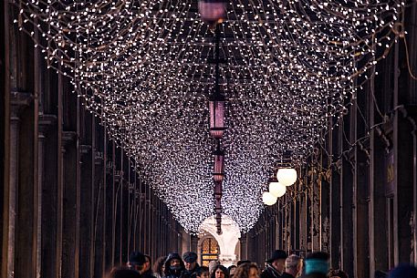 The arcades of St Mark square decorated for Christmas The arcades of St Mark square decorated for Christmas