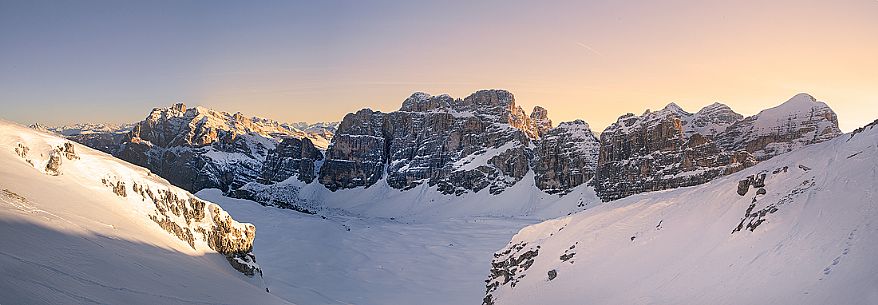 The group of Fanis and Tofane during a winter sunrise