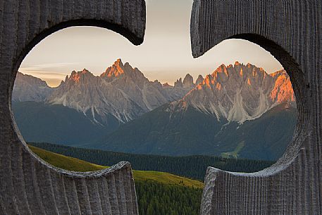 Sesto Dolomites (Cima di Sesto, Punta Tre Scarperi, Tre Cime di Lavaredo and Rocca dei Baranci ) at dawn from Bonner refuge in Dobbiaco, South Tyrol, Italy