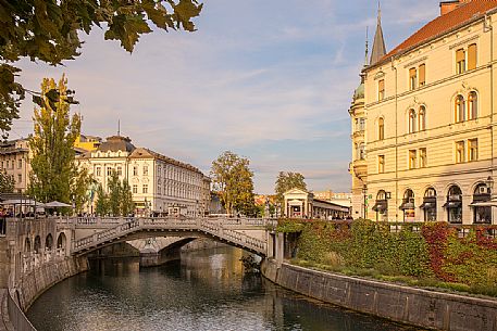 The small and characteristic Triple Bridge or Tromostovje bridge, elegant access to Old Town, Lubiana, Slovenia