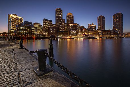 Boston skyline from the Boston harbor during the blue hour, New England, USA