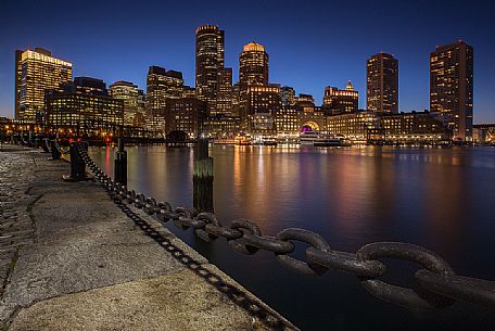 Boston skyline from the Boston harbor during the blue hour, New England, USA