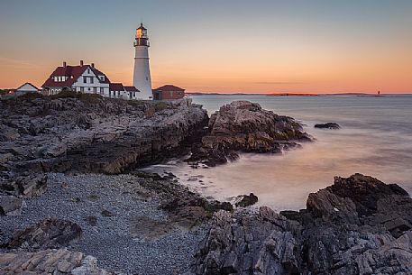 Sunset at the Portland Head Lighthouse, the oldest lighthouse in Maine, New England, USA Sunset at the Portland Head Lighthouse, the oldest lighthouse in Maine, New England, USA