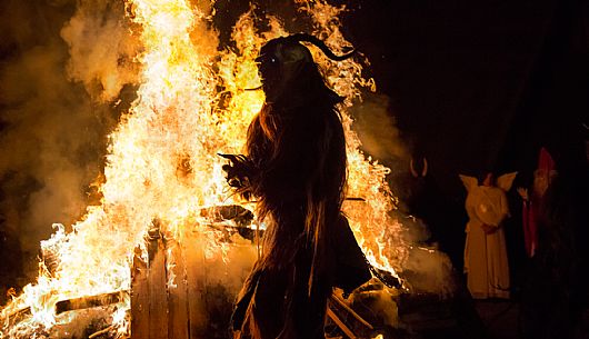 Krampus during the traditional festival. The Krampus are men-wild goats and very disturbing that roam the streets in search of children 