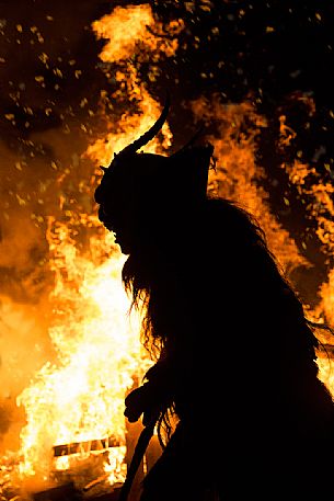 Krampus during the traditional festival. The Krampus are men-wild goats and very disturbing that roam the streets in search of children 