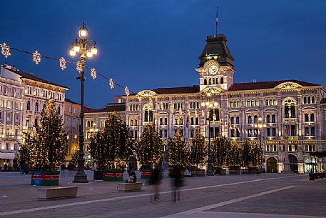 Unity of Italy Square or Piazza Unit d'Italia with the Town Hall on background at Christmas time, Trieste