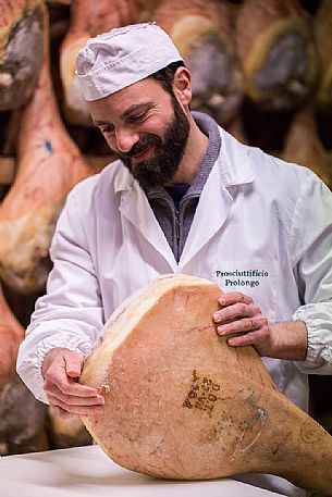 Grouting of the San Daniele del Friuli ham at the Prolongo ham industry, Italy Grouting of the San Daniele del Friuli ham at the Prolongo ham industry, Italy