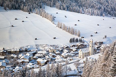 Sesto village from above after a snowfall, Pusteria valley, Italy