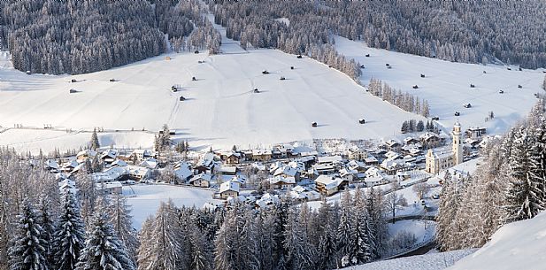 Sesto village from above after a snowfall, Pusteria valley, Italy