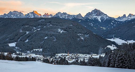 Panoramic view from Rasun di Sotto towards Monguelfo and Tesido with the  Dolomites on background, Pusteria valley, Italy
