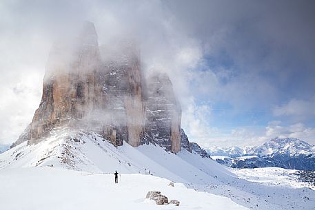 Low clouds surround the Tre Cime of Lavaredo, dolomites, Italy