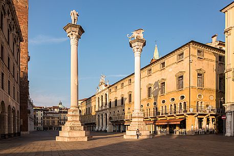 Piazza dei Signori, the main square in the historical center of Vicenza with the two columns erected between the fifteenth and seventeenth centuries and the Monte Piet palace in the background, Vicenza, Italy