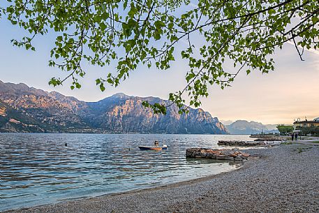 Early lights on the shores of Garda lake at Malcesine, Italy
