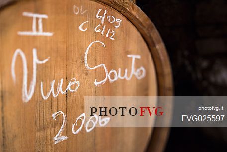 Barrel of Vino Santo of the Cantina Pisoni located between the Dolomites and Lake Garda, specializing in Vino Santo, red and white wines of Trentino Alto Adige, Valley of Lakes, Valle dei Laghi, Italy