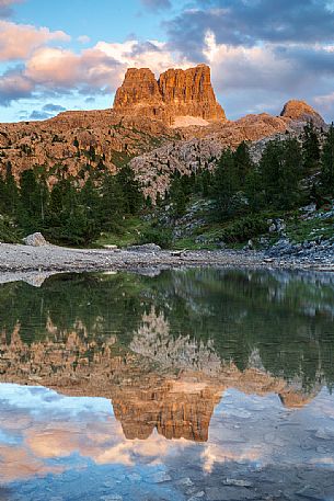 The Averau Mount reflected on the little pond of Limedes at sunset, Cortina D'Ampezzo, Dolomites, Italy