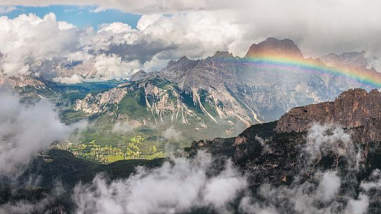 Rainbow above Cortina d'Ampezzo after an intensive thunderstorm, with the Sorapiss on the background photographed from the Nuvolau refuge, Dolomites, Cortina D'Ampezzo, Italy