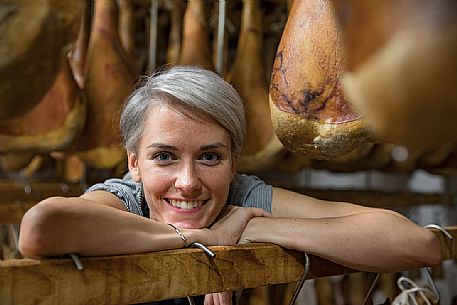 Monica D'Osvaldo in the historic ham company D'Osvaldo in Cormons, Friuli Venezia Giulia, Italy Monica D'Osvaldo in the historic ham company D'Osvaldo in Cormons, Friuli Venezia Giulia, Italy