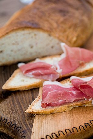 Prosciutto ham of the agriturismo Bajta Fattoria Carsica of Trieste, Friuli Venezia Giulia, Italy