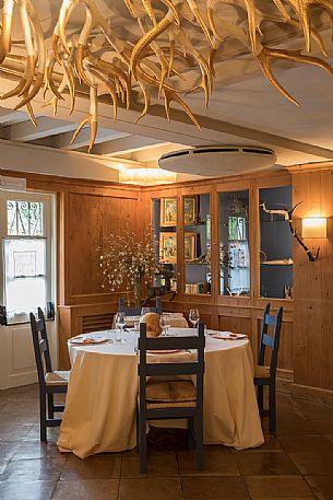 The hunting room of the starred restaurant La Subida, Trattoria al Cacciatore in Cormons, Friuli Venezia Giulia, Italy