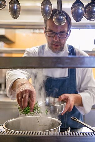 The starred chef Allessandro Gavagna in the kitchen of the La Subida, Trattoria al Cacciatore in Cormons, Friuli Venezia Giulia, Italy The starred chef Allessandro Gavagna in the kitchen of the La Subida, Trattoria al Cacciatore in Cormons, Friuli Venezia Giulia, Italy